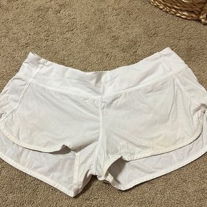 white lululemon speed up shorts